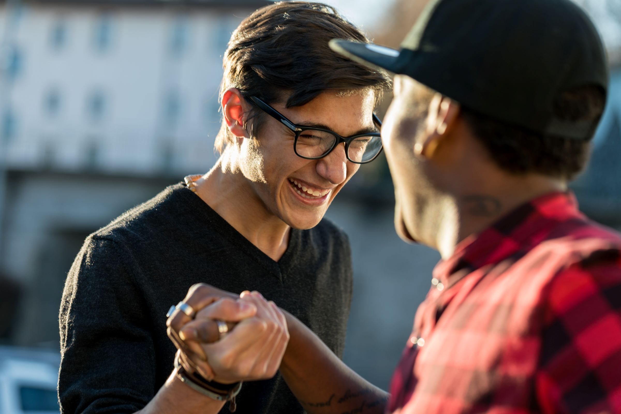 two men greeting each other