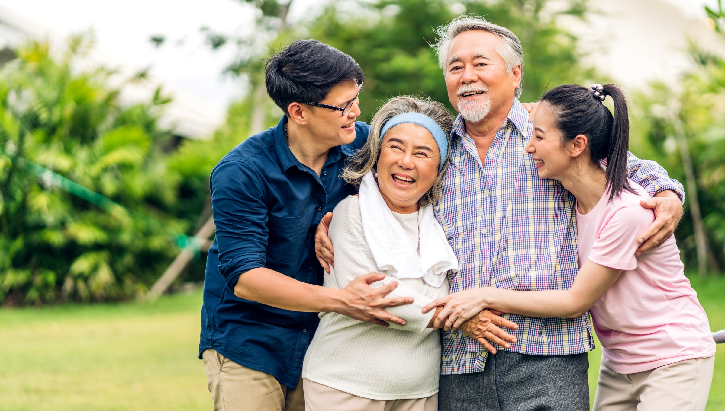 happy adult family hugging